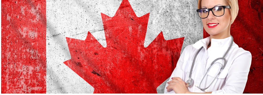A doctor standing in front of a canada flag